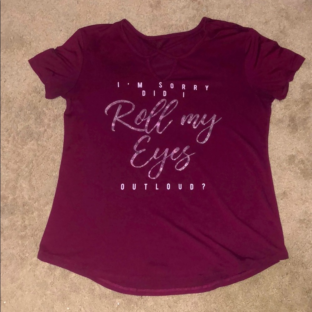 A shirt that has a cute saying on it.